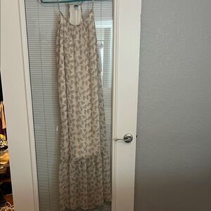 Elegant Cream Maxi Dress with Paisley Print
